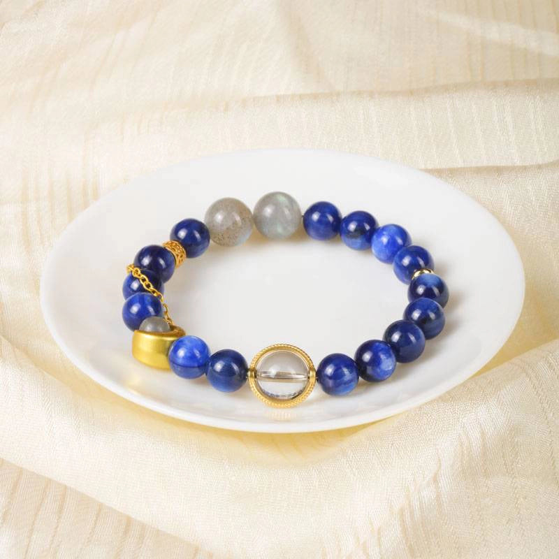 Van Gogh Starry Night-inspired Blue Crystal bracelet with Moonstone, Clear Quartz, and gold moon charm by Roline Crystal