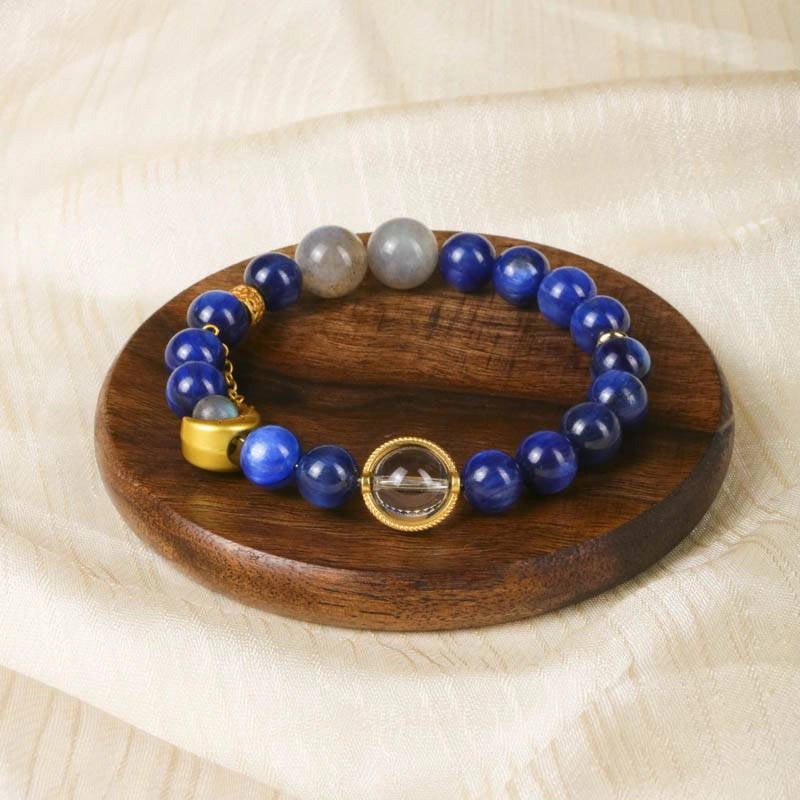 Van Gogh Starry Night-inspired Blue Crystal bracelet with Moonstone, Clear Quartz, and gold moon charm by Roline Crystal