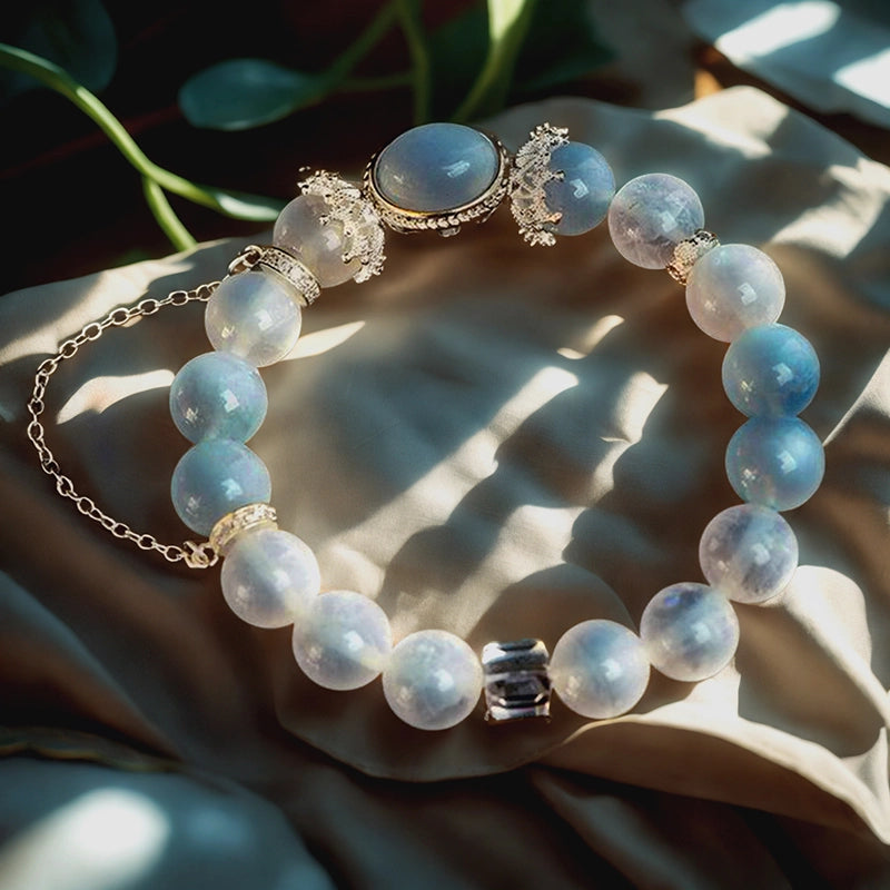 White Phantom Quartz bracelet with aquamarine, clear quartz, and silver accents by Roline Crystal