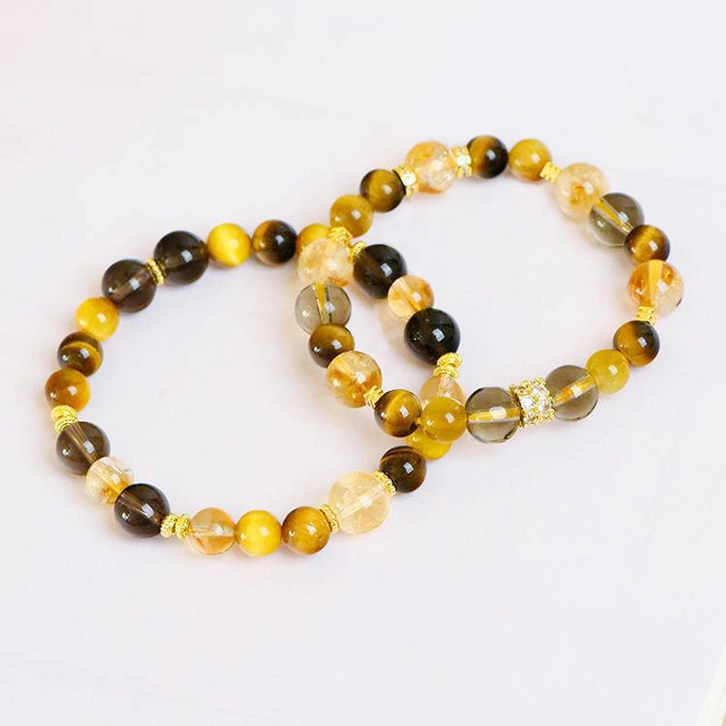 Yellow Topaz couple bracelets with Tiger Eye, Smoky Quartz, and gold accents – matching energy jewelry by Roline Crystal