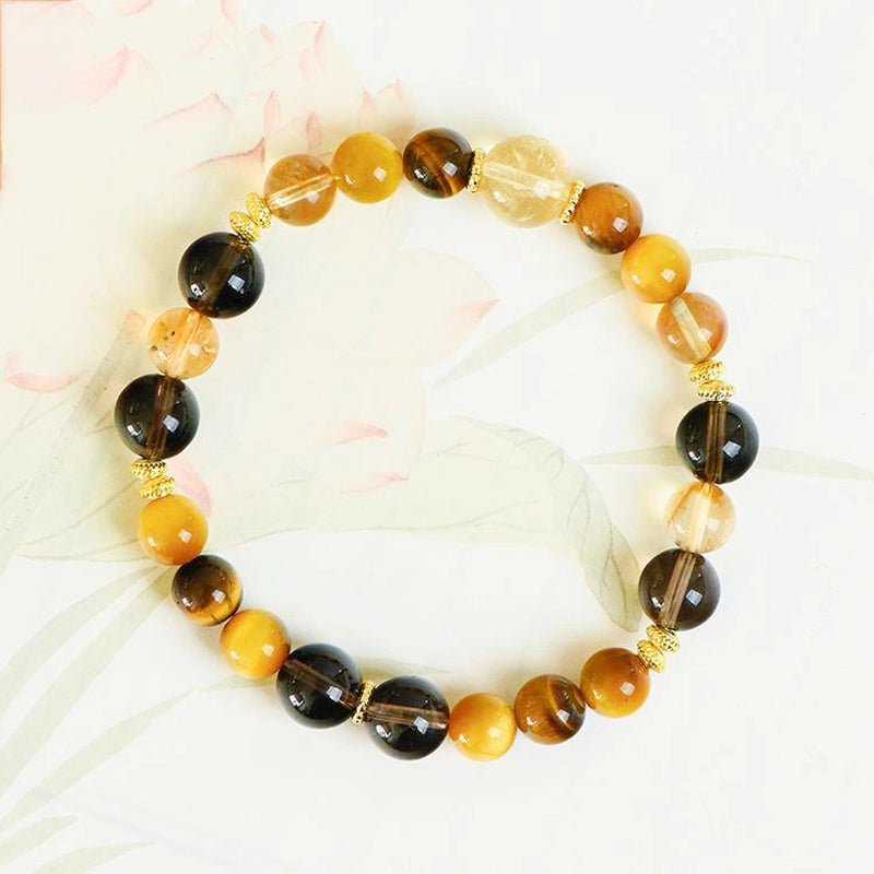 Yellow Topaz couple bracelets with Tiger Eye, Smoky Quartz, and gold accents – matching energy jewelry by Roline Crystal