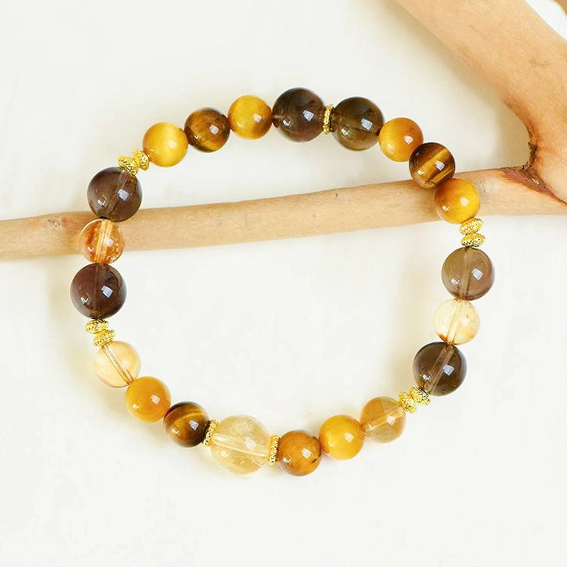 Yellow Topaz couple bracelets with Tiger Eye, Smoky Quartz, and gold accents – matching energy jewelry by Roline Crystal