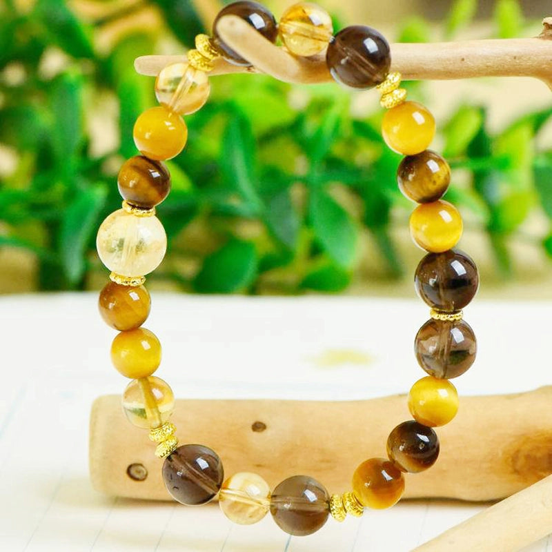 Yellow Topaz couple bracelets with Tiger Eye, Smoky Quartz, and gold accents – matching energy jewelry by Roline Crystal
