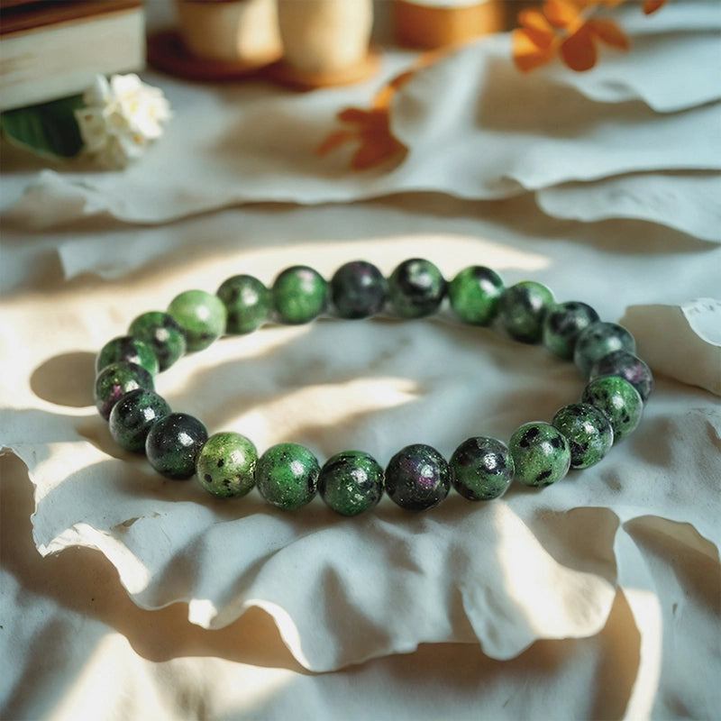 Zoisite bracelet with 8mm green polished beads by Roline Crystal