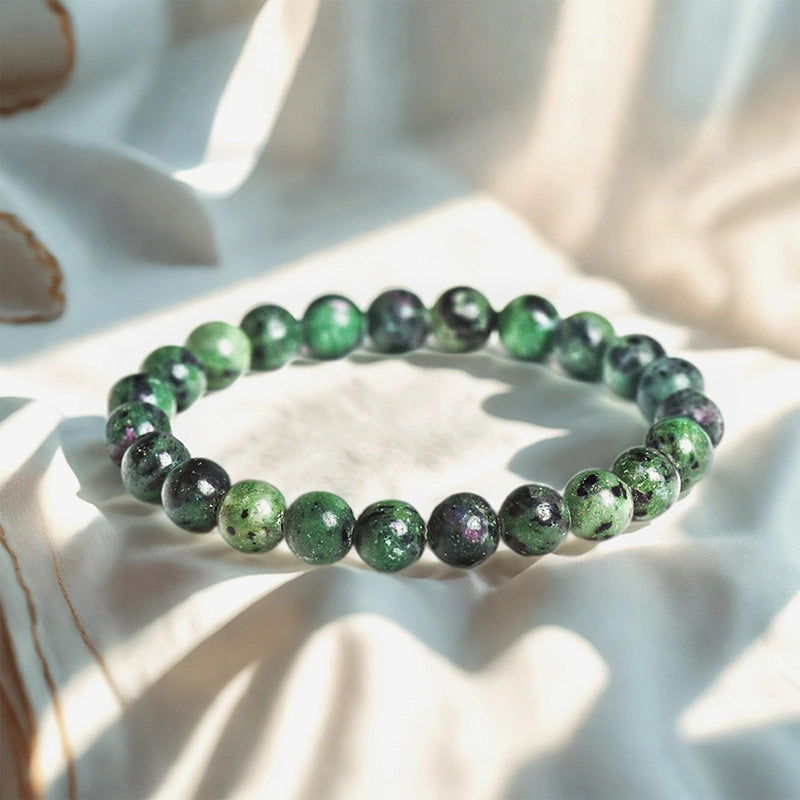 Zoisite bracelet with 8mm green polished beads by Roline Crystal
