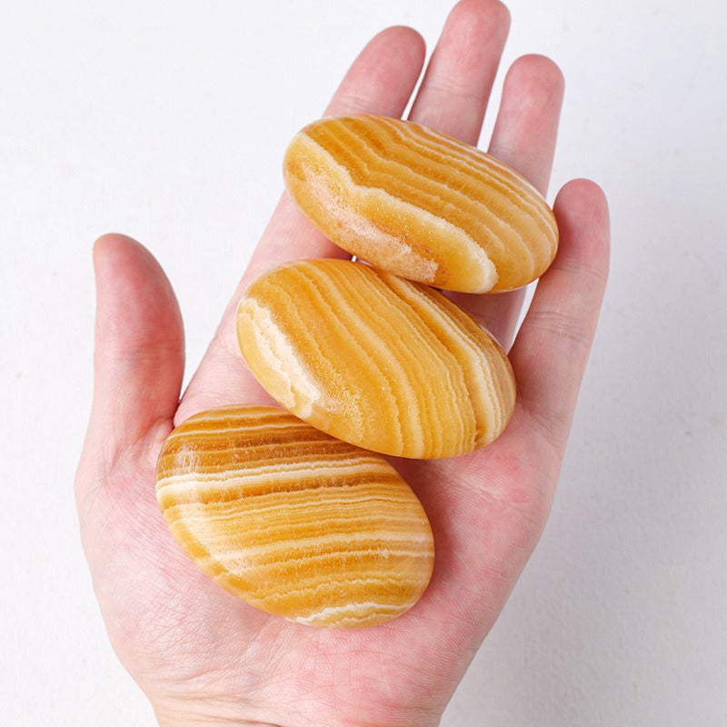 Yellow Calcite Palm Stone - Emotional Elevation, Creativity & Happiness