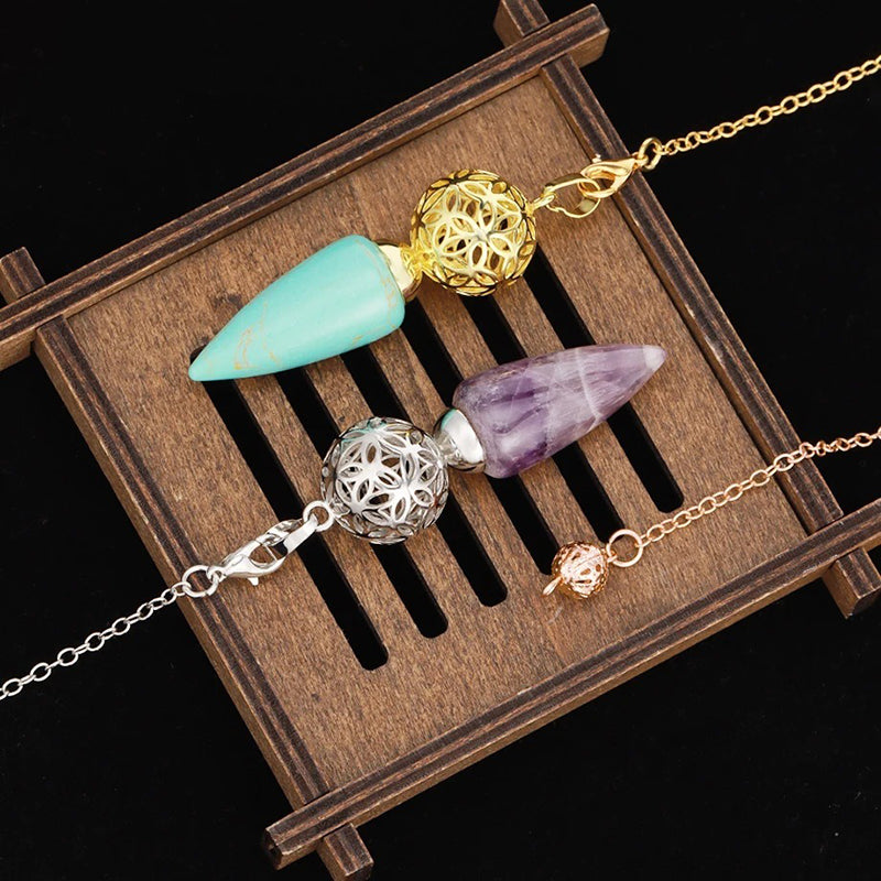 Natural crystal pendulum - bullet-shaped design, hollow circle, special for witch magic