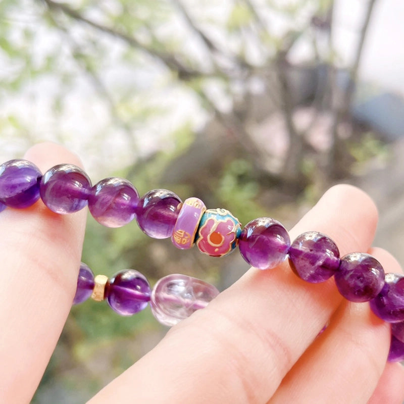 Amethyst bracelet with Pixiu charm and Golden Rutilated Quartz beads by Roline Crystal