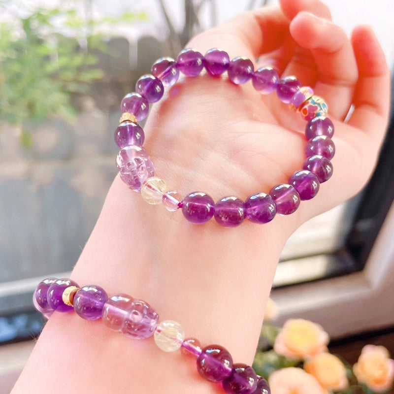 Amethyst bracelet with Pixiu charm and Golden Rutilated Quartz beads by Roline Crystal