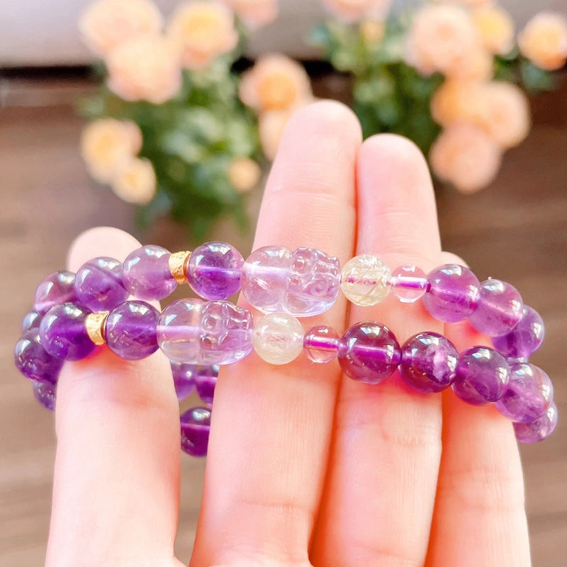 Amethyst bracelet with Pixiu charm and Golden Rutilated Quartz beads by Roline Crystal