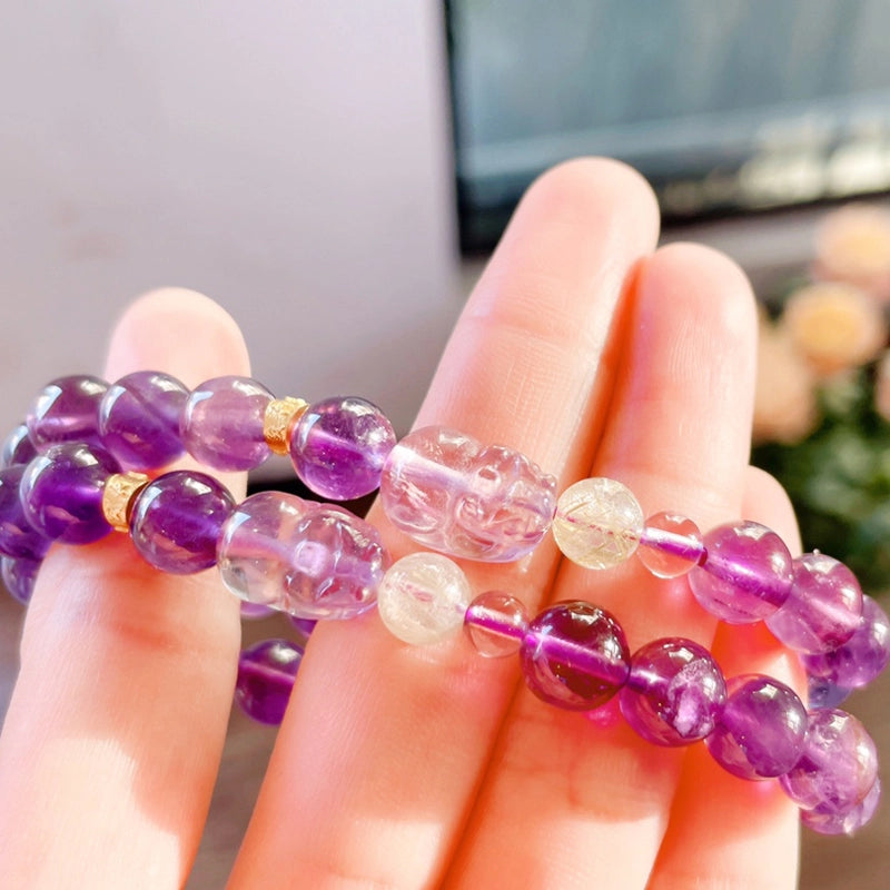 Amethyst bracelet with Pixiu charm and Golden Rutilated Quartz beads by Roline Crystal