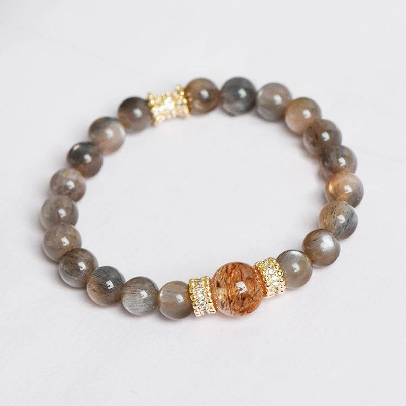 Black Sunstone bracelet with Black Gold Super 7 stones and gold accents – cosmic protection jewelry by Roline Crystal