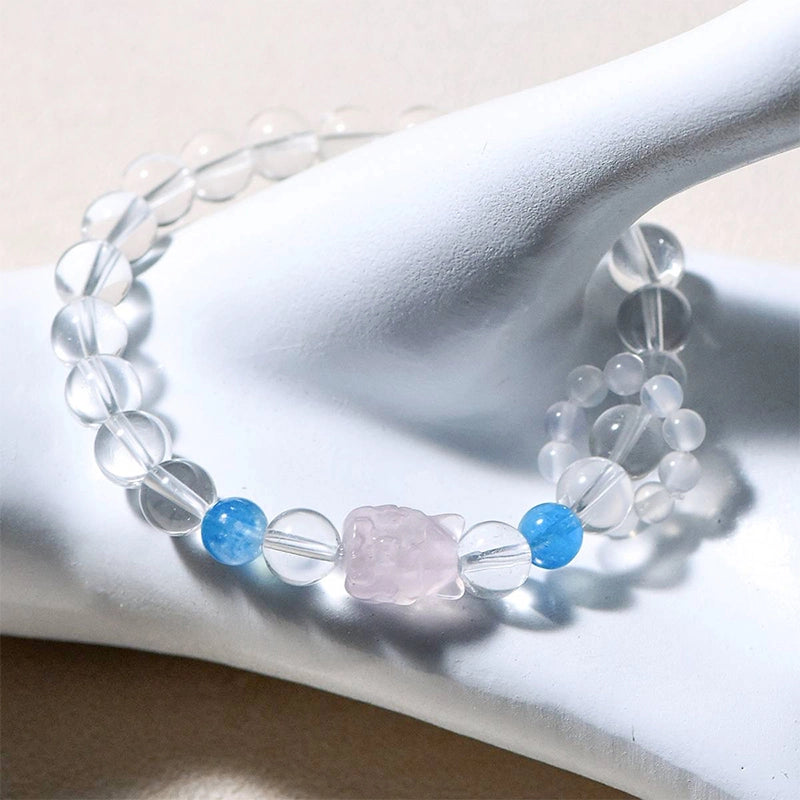 Clear Quartz bracelet with Aquamarine, Rose Quartz fox charm, and White Agate beads by Roline Crystal