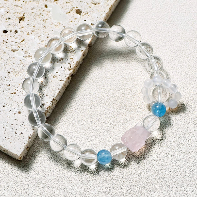 Clear Quartz bracelet with Aquamarine, Rose Quartz fox charm, and White Agate beads by Roline Crystal