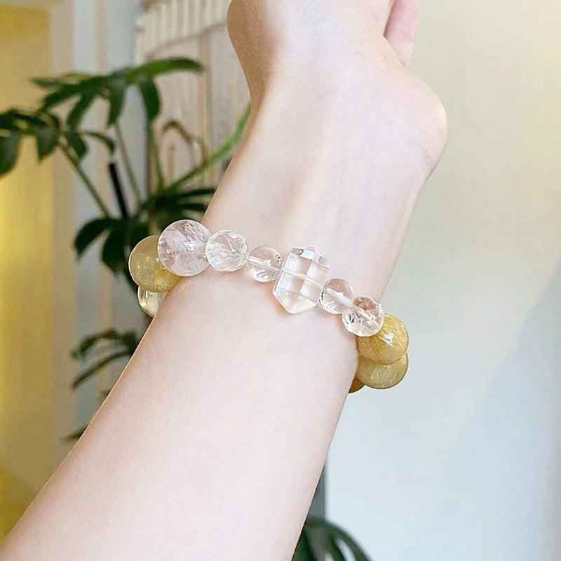 Golden rutilated quartz bracelet with citrine and double-terminated clear quartz beads by Roline Crystal