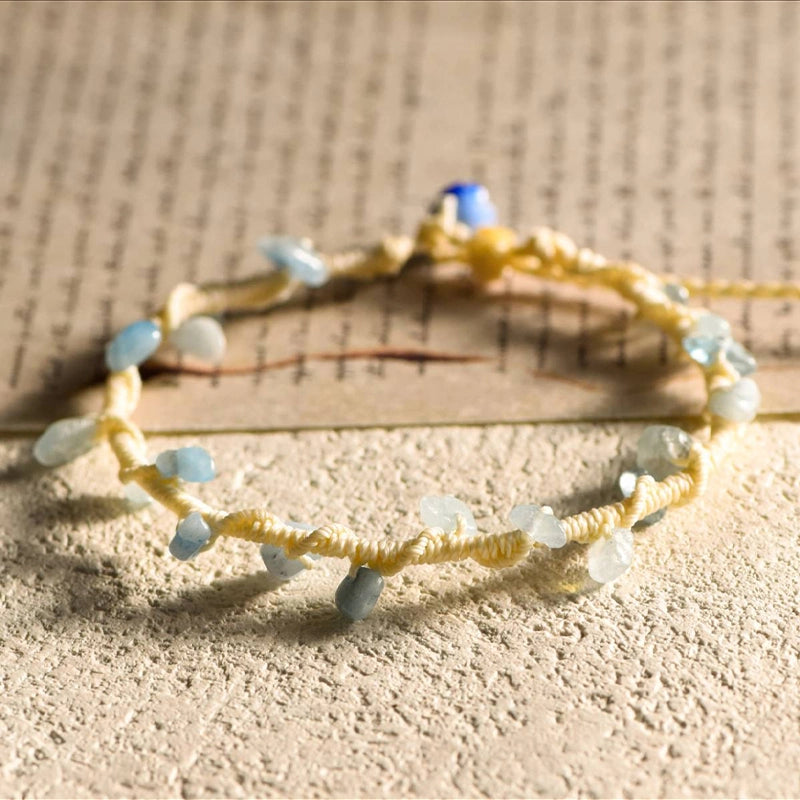 Hand-woven gravel crystal bracelet with peridot, strawberry quartz, citrine, aquamarine, and amethyst by Roline Crystal