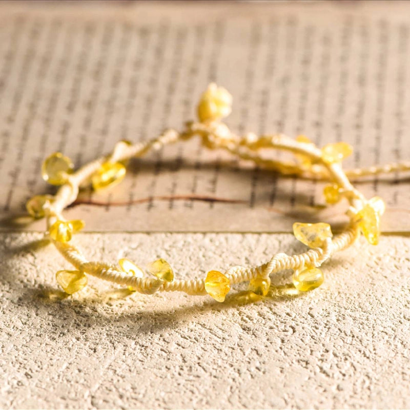 Hand-woven gravel crystal bracelet with peridot, strawberry quartz, citrine, aquamarine, and amethyst by Roline Crystal