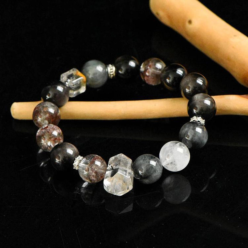 Phantom Quartz bracelet with Silver Sheen Obsidian, Flash Stone points, and silver charms – mystical crystal jewelry by Roline Crystal