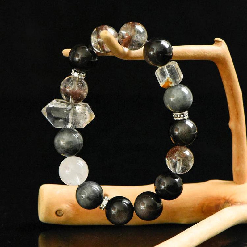 Phantom Quartz bracelet with Silver Sheen Obsidian, Flash Stone points, and silver charms – mystical crystal jewelry by Roline Crystal