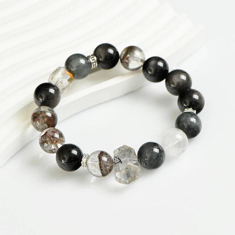 Phantom Quartz bracelet with Silver Sheen Obsidian, Flash Stone points, and silver charms – mystical crystal jewelry by Roline Crystal