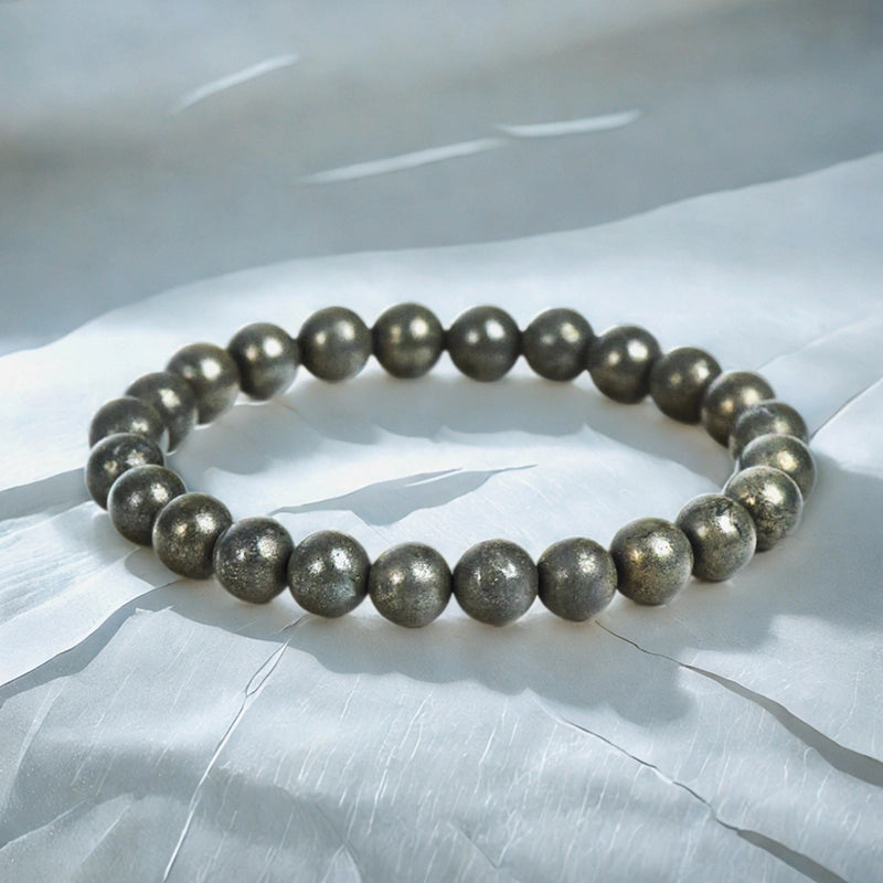 Pyrite bracelet with golden metallic beads by Roline Crystal