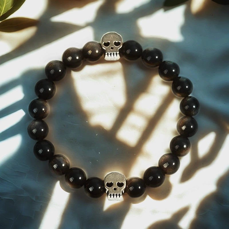 Silver Obsidian bracelet with Tree of Life, owl, lion, and yin-yang charms by Roline Crystal