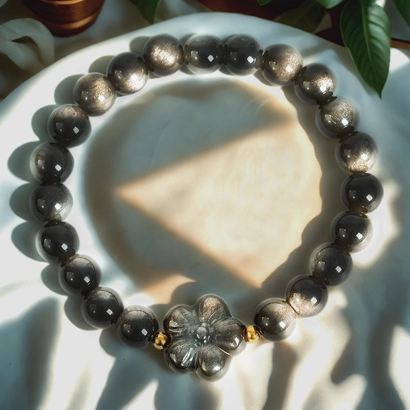 Silver Obsidian bracelet with floral, nine-tailed fox, and rabbit charms by Roline Crystal