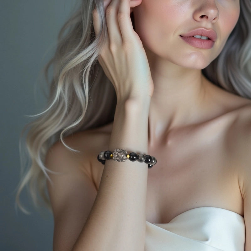 Silver Obsidian bracelet with floral, nine-tailed fox, and rabbit charms by Roline Crystal