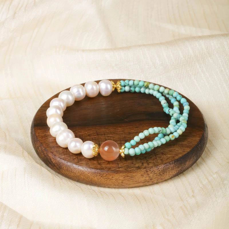Van Gogh Almond Blossom-inspired Turquoise bracelet with pearls, agate, and gold accents by Roline Crystal